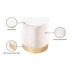 Taburete otomano de terciopelo con forma de corazón, tapicería color crema, base de acero inoxidable dorado, diseño contemporáneo