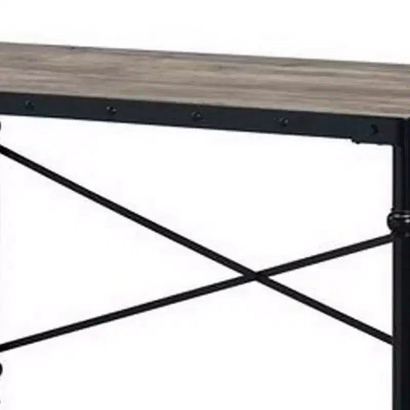 Escritorio con ruedas y detalles de tachuelas, tablero con vetas de madera, patas de metal, estilo industrial, negro
